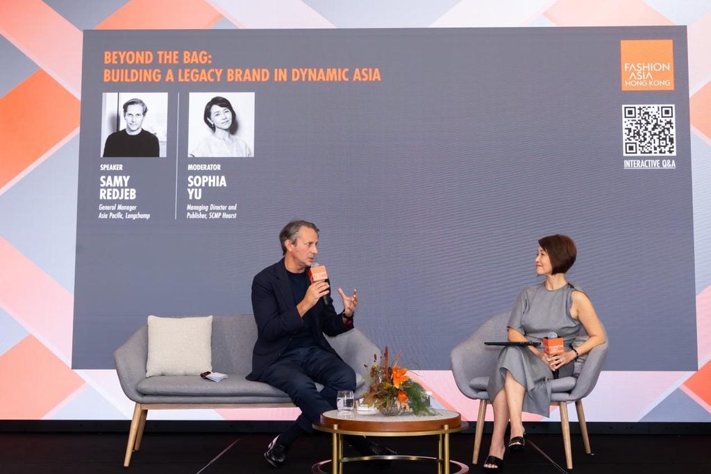 Samy Redjeb of Longchamp speaks with Sophia Yu of SCMP Hearst at the Fashion Challenges Forum 2026 in Hong Kong.